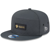 New Orleans Saints New Era 2025 Sideline Cold Weather Split Panel 9FIFTY Snapback Hat - Charcoal cheap