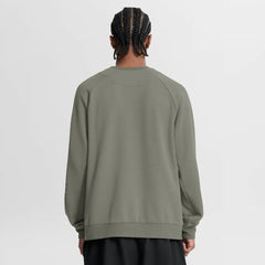Atlanta Braves Statement Primary Raglan Dri-FIT Sweatshirt - Olive | Nike