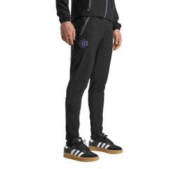 Manchester United 2025/26 Tiro Vis Tech AEROREADY Travel Pants - Black | Adidas for sale